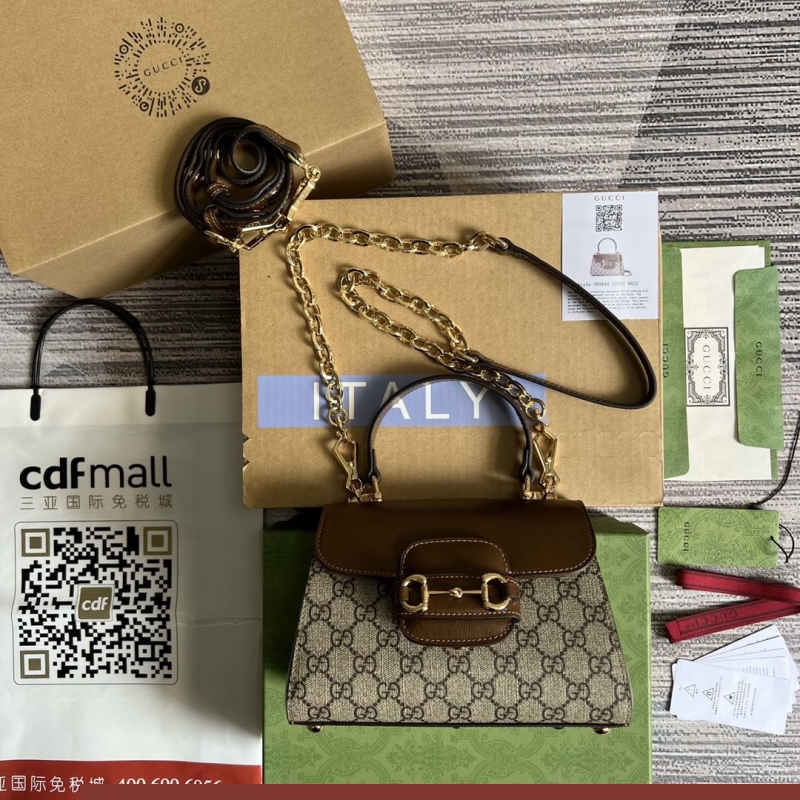 G*u*i top handle bags